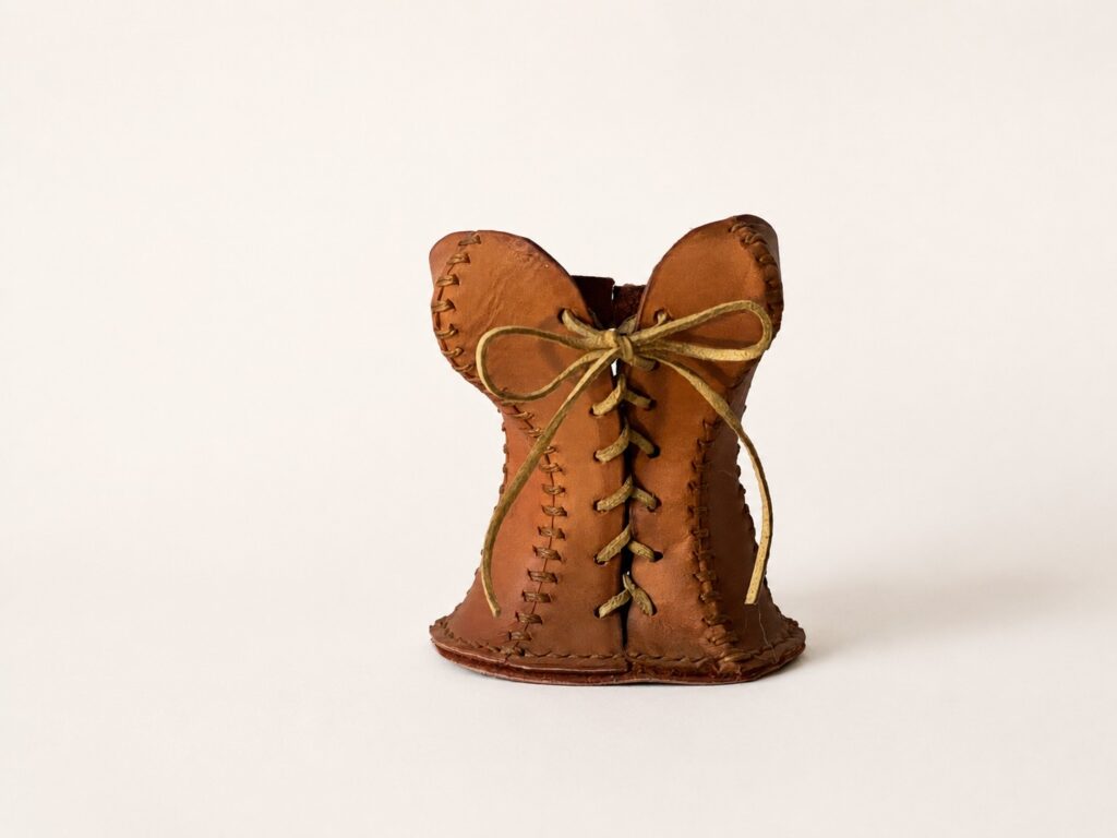 Hand Stitched Leather Corset pen holder.
