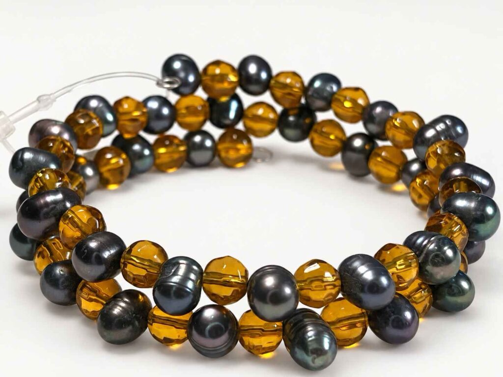 Spiral Bracelet with Purple/Black freshwater pearls citrine coloured faceted glass beads