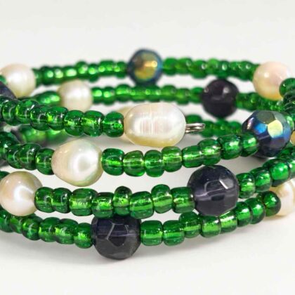 Spiral Bracelet with freshwater pearls and purple faceted glass and green seed beads