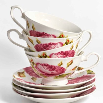 Four Tea cups and Saucers with roses