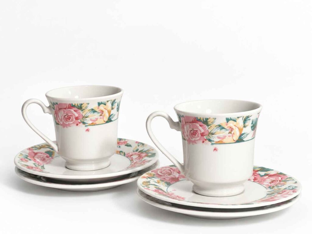 Two Floral tea cups with four saucers